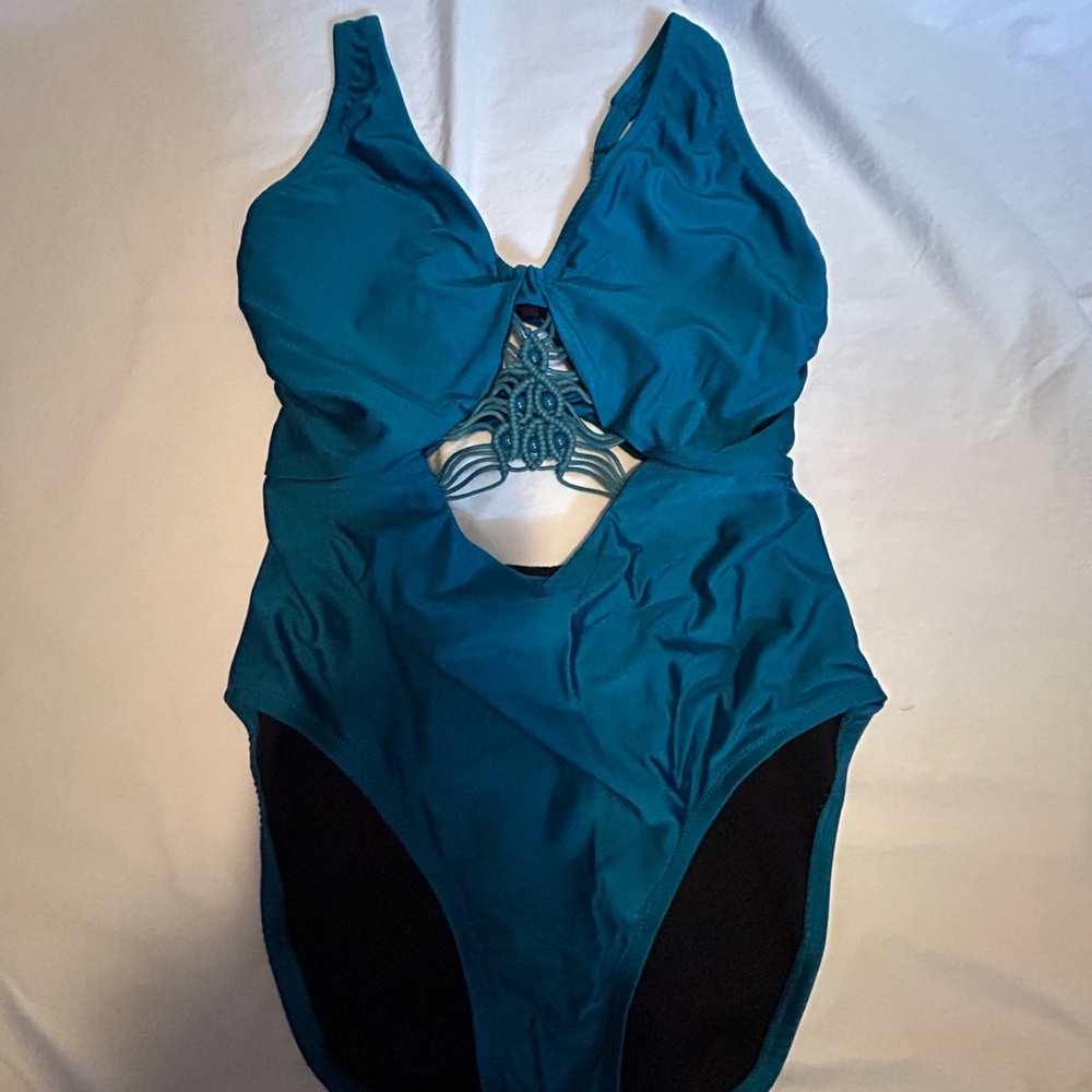 Gorgeous teal green one piece with bust line detailing